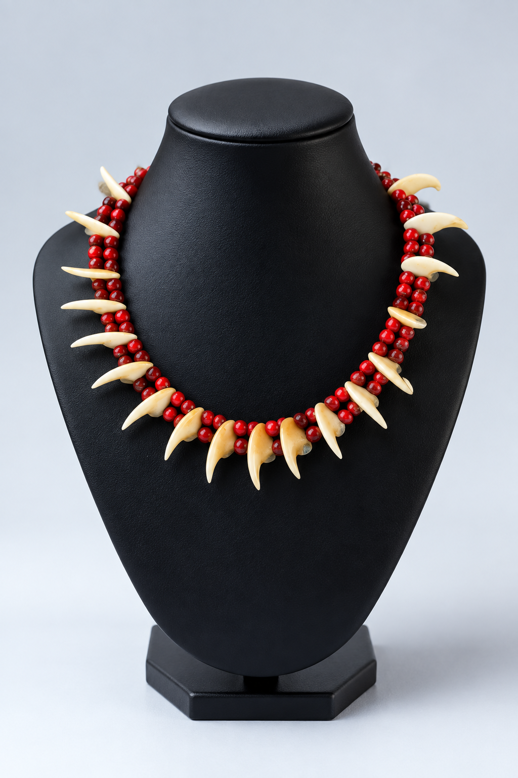 African Claw and Crystal Necklace on display bust