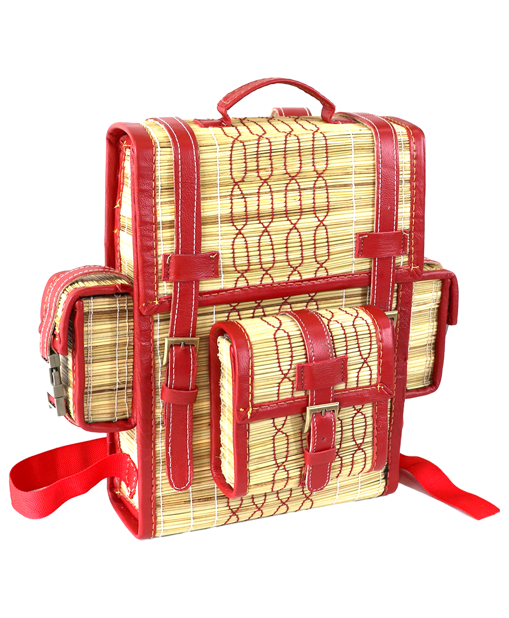 Woven reed backpack with red leather trim and buckle straps
